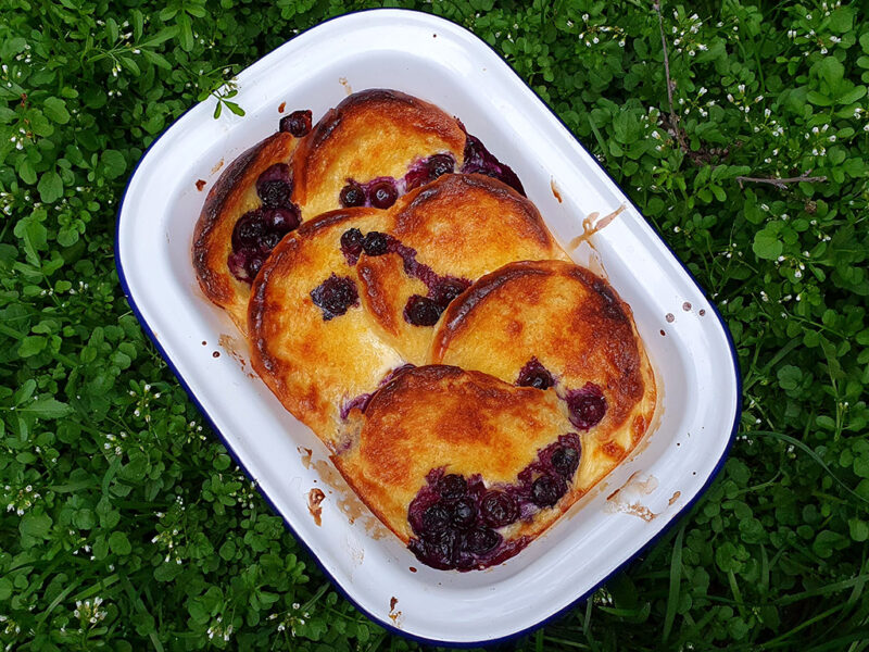 Brioche bread and butter pudding with blueberries