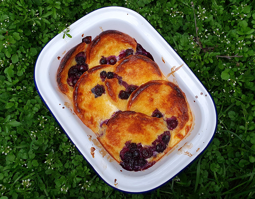 Brioche bread and butter pudding with blueberries