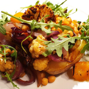 Baked potatoes with roasted cauliflower and chickpeas