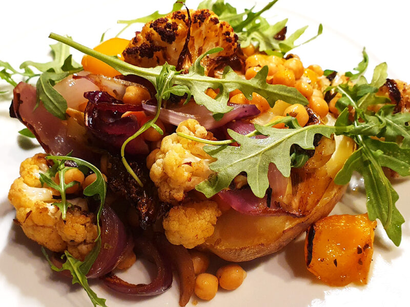 Baked potatoes with roasted cauliflower and chickpeas