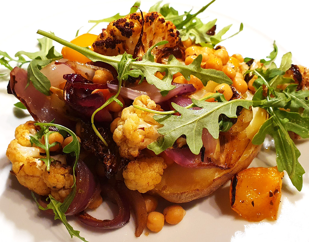 Baked potatoes with roasted cauliflower and chickpeas