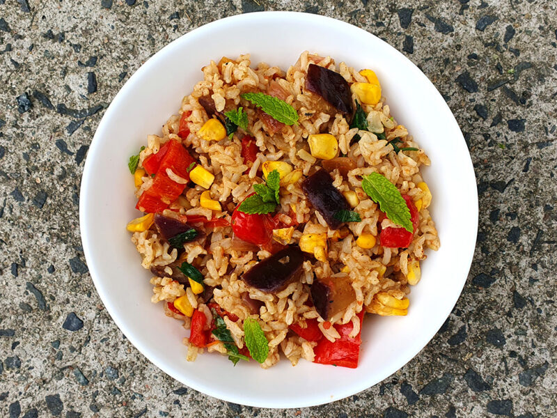 Spiced rice with aubergine and corn