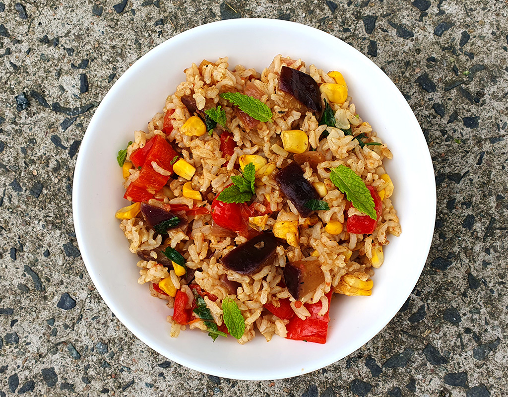 Spiced rice with aubergine and corn