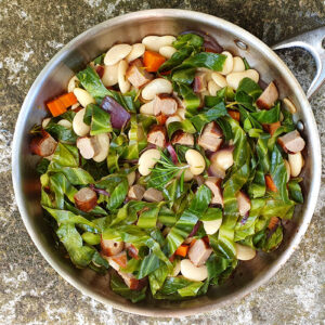 Sauteed cabbage with beans and sausage