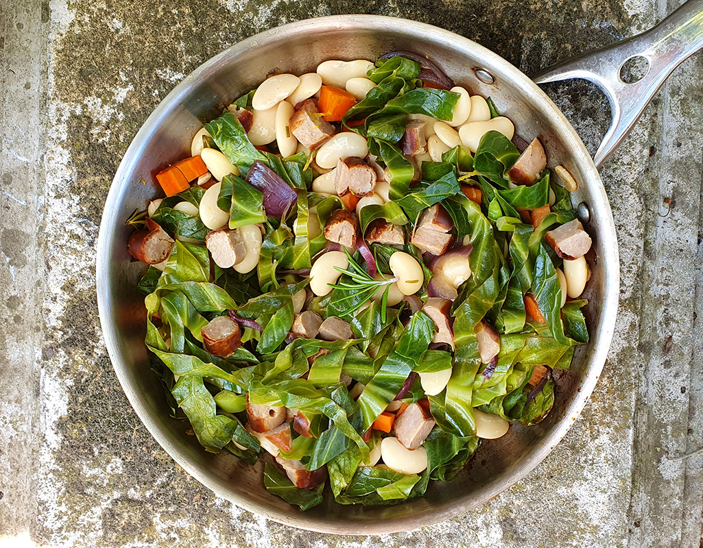 Sauteed cabbage with beans and sausage