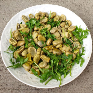 Lemon broad beans with wild rocket