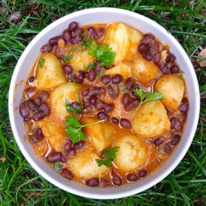 Potatoes and beans in tomato sauce