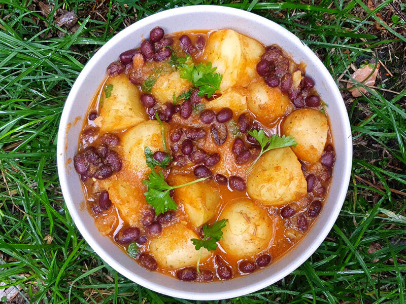 Potatoes and beans in tomato sauce