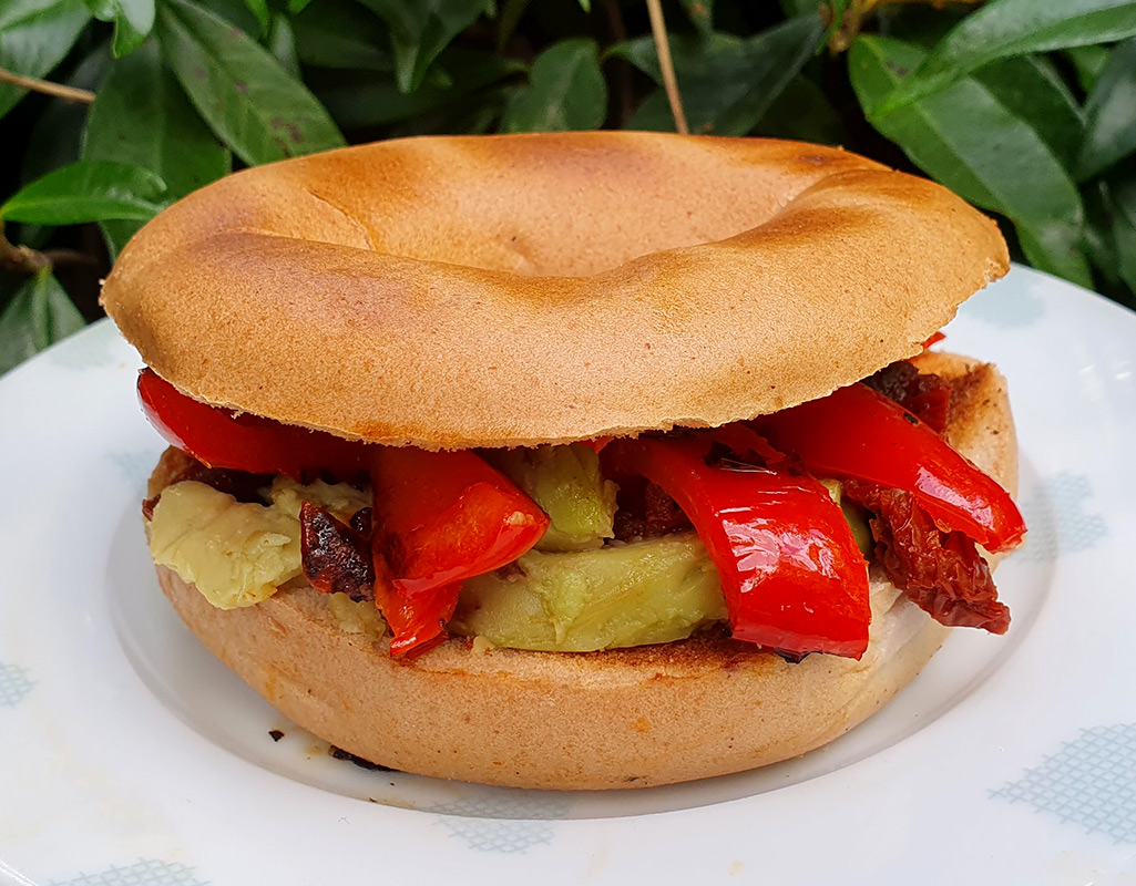 Bagel with avocado and grilled pepper