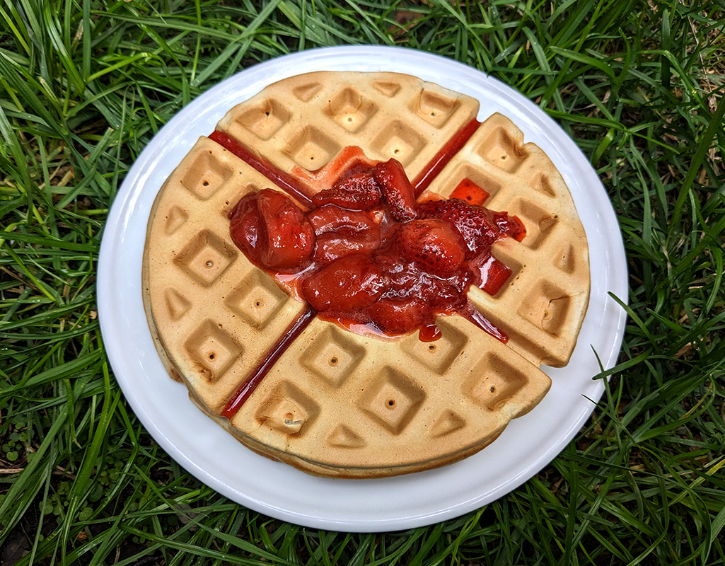 Banana waffles with strawberry compote