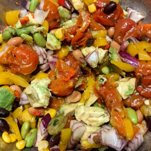 Grilled tomatoes, beans and avocado salad