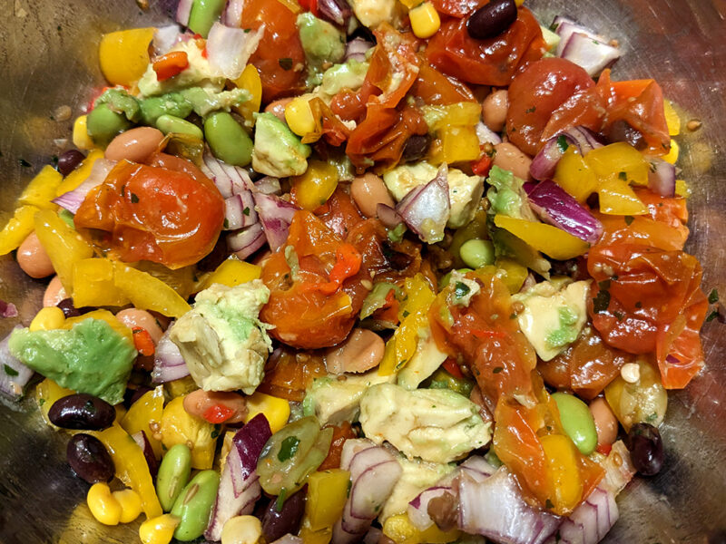 Grilled tomatoes, beans and avocado salad