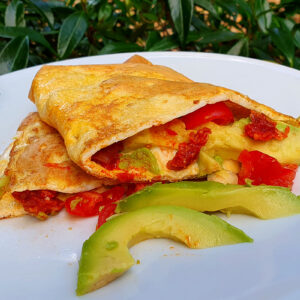 Omelette with avocado and tomato