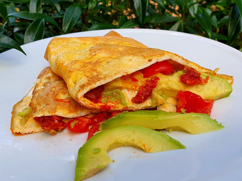 Omelette with avocado and tomato