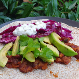 Chipotle bean and avocado tortilla wrap