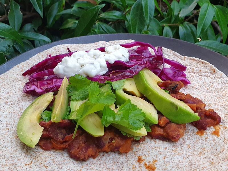 Chipotle bean and avocado tortilla wrap