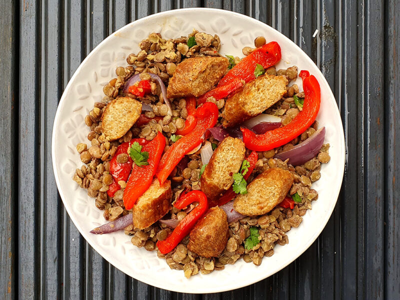 Lentils with roasted vegetables and sausages