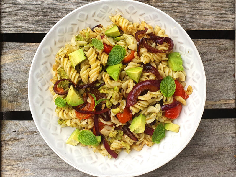 Avocado pesto pasta with caramelised onion