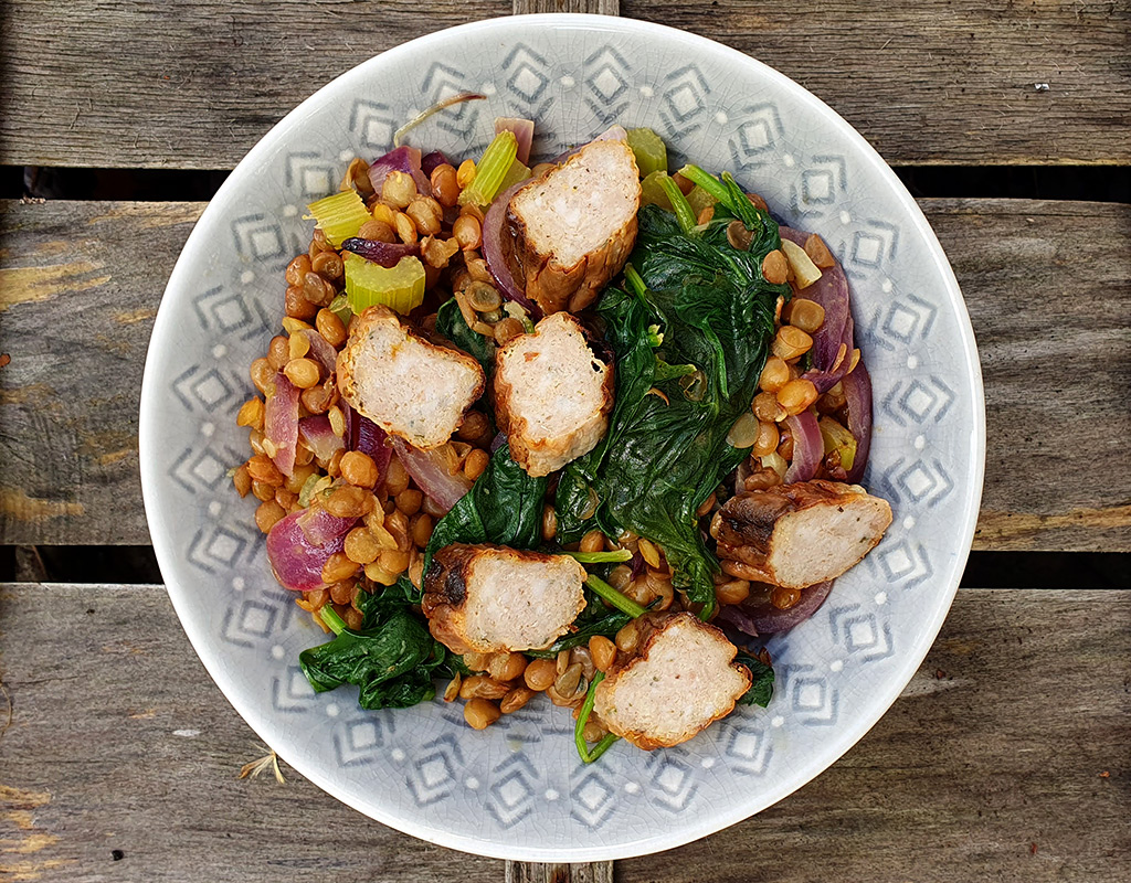 Sausage, lentil and spinach salad