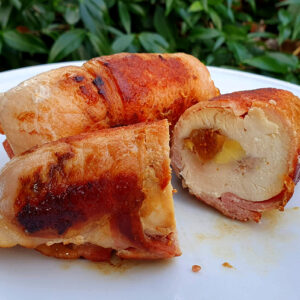 Bacon wrapped chicken breast stuffed with chestnut and figs