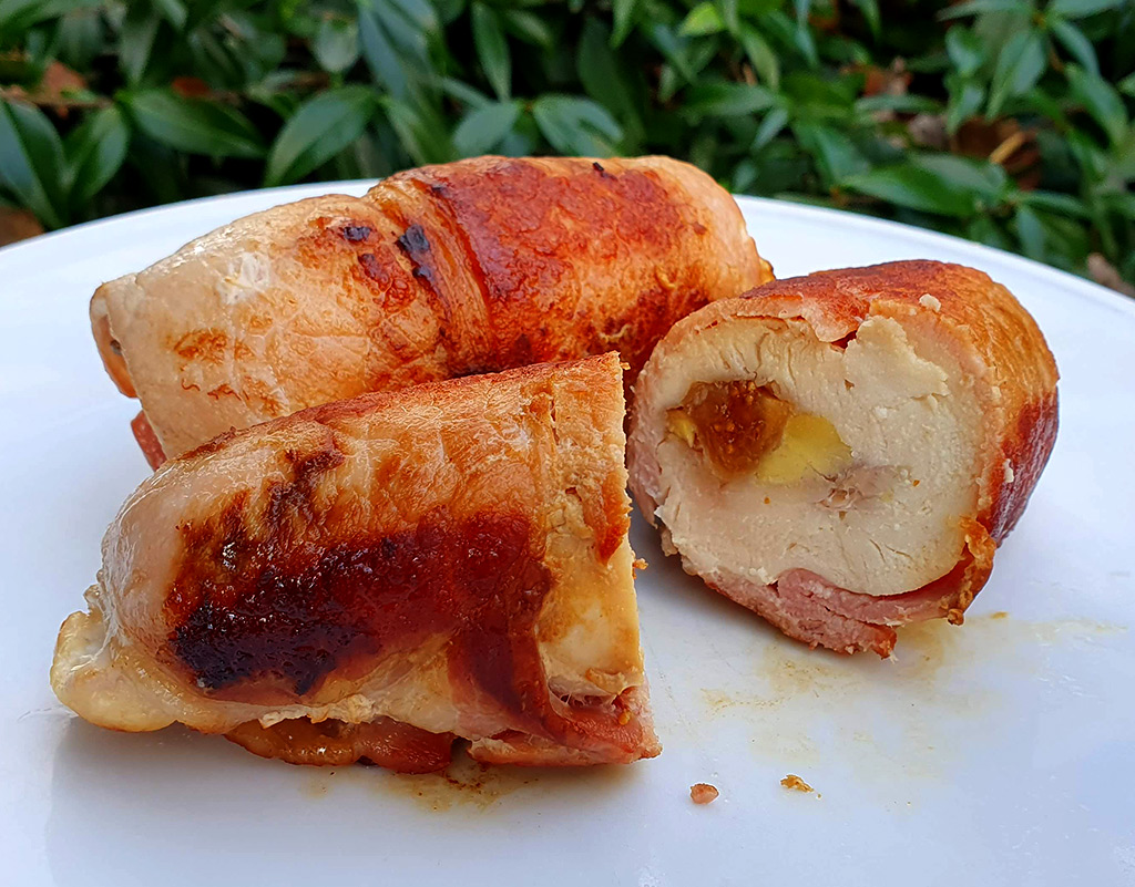 Bacon wrapped chicken breast stuffed with chestnut and figs