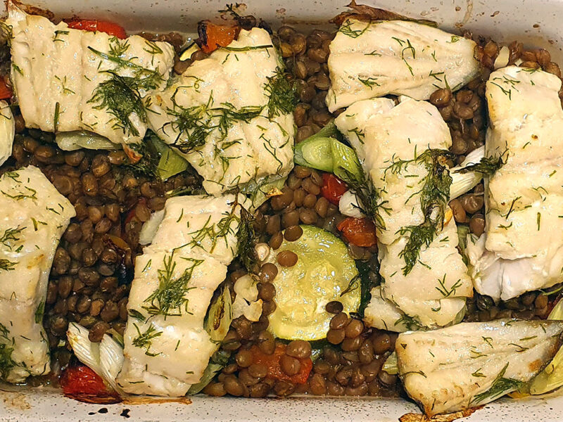 Baked cod with courgette and lentils