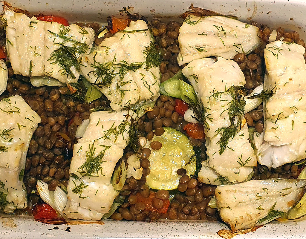 Baked cod with courgette and lentils