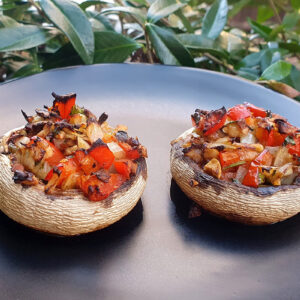 Mushroom stuffed with red pepper and walnuts