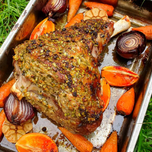 Roasted leg of lamb with bay, orange and garlic rub