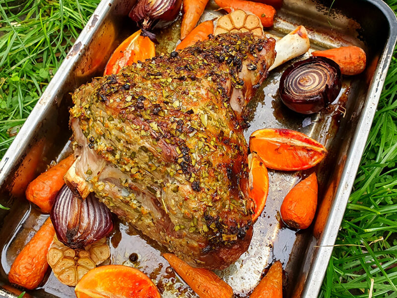 Roasted leg of lamb with bay, orange and garlic rub