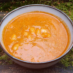 Tomato and sweet potato soup with beans