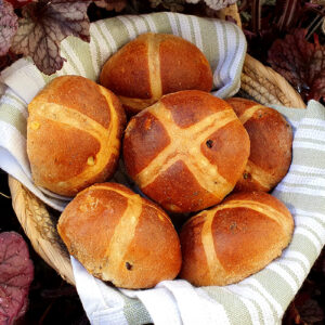 Hot cross buns with sour cherries and poppy seeds