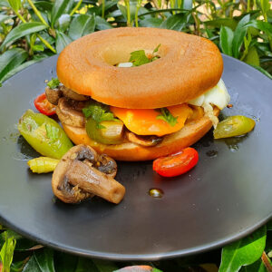 Bagel with egg and mushrooms