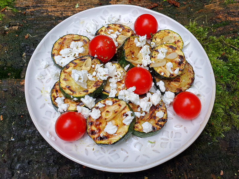 Grilled courgette with feta and tomato