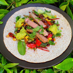 Steak and black beans tortilla wrap