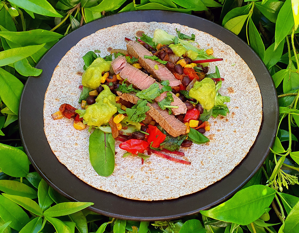 Steak and black beans tortilla wrap