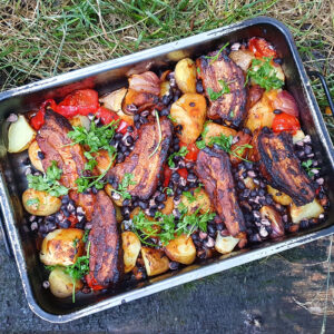 Pork belly, potatoes and beans traybake