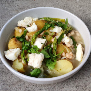 Potato, beans and fish stew with asparagus