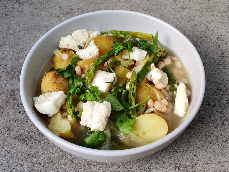 Potato, beans and fish stew with asparagus