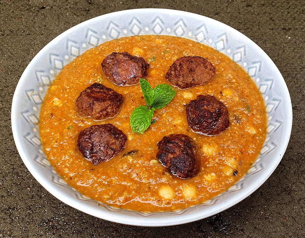 Meatballs in roasted aubergine and chickpea sauce