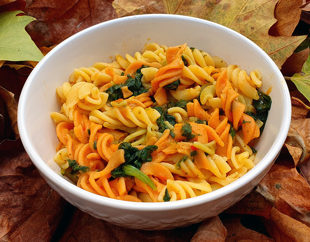 Spinach pasta with butternut squash sauce