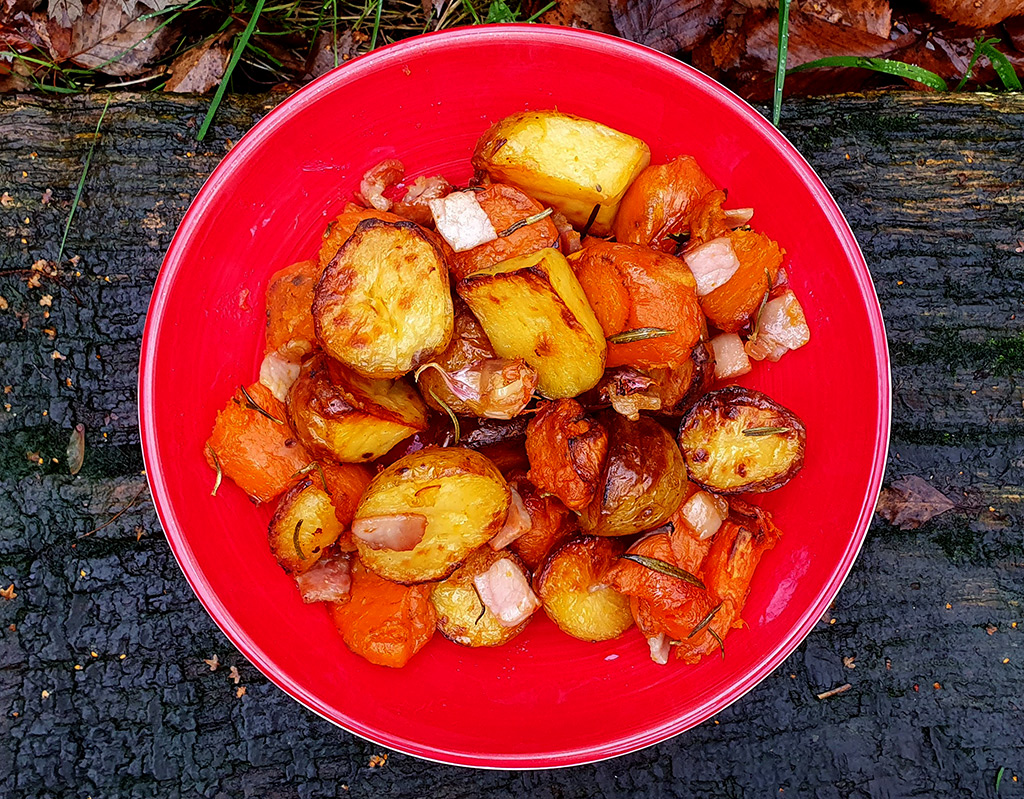 Roast potatoes and sweet potatoes with bacon