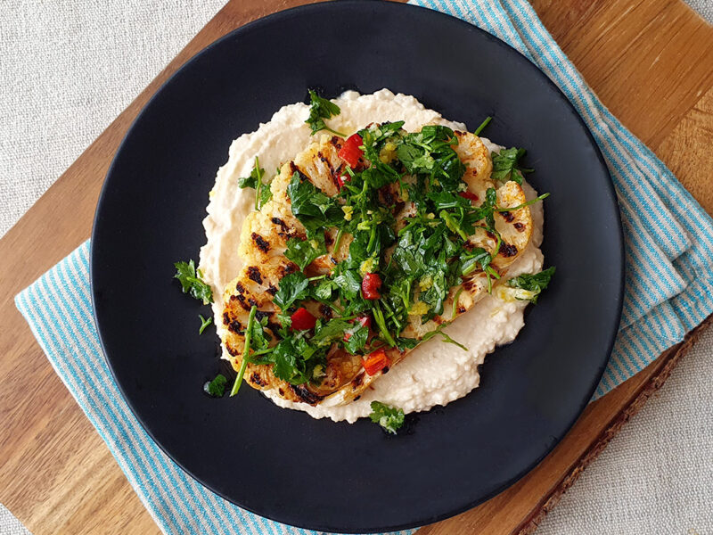 Cauliflower steak with bean hummus and chili gremolata