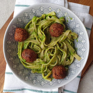 Pea and watercress pasta with vegan meatballs