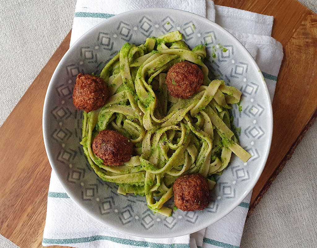 Pea and watercress pasta with vegan meatballs