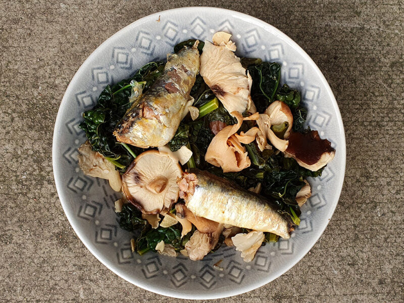 Sauteed mushroom and cabbage with sardines