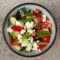 Summer garden salad with sheep cheese