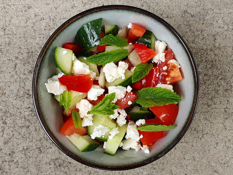 Summer garden salad with sheep cheese