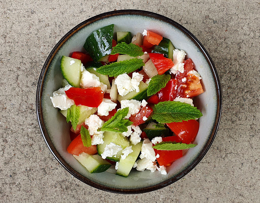 Summer garden salad with sheep cheese