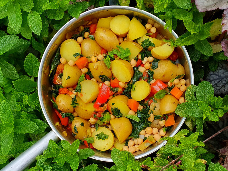 Curried potatoes with chickpeas and kale